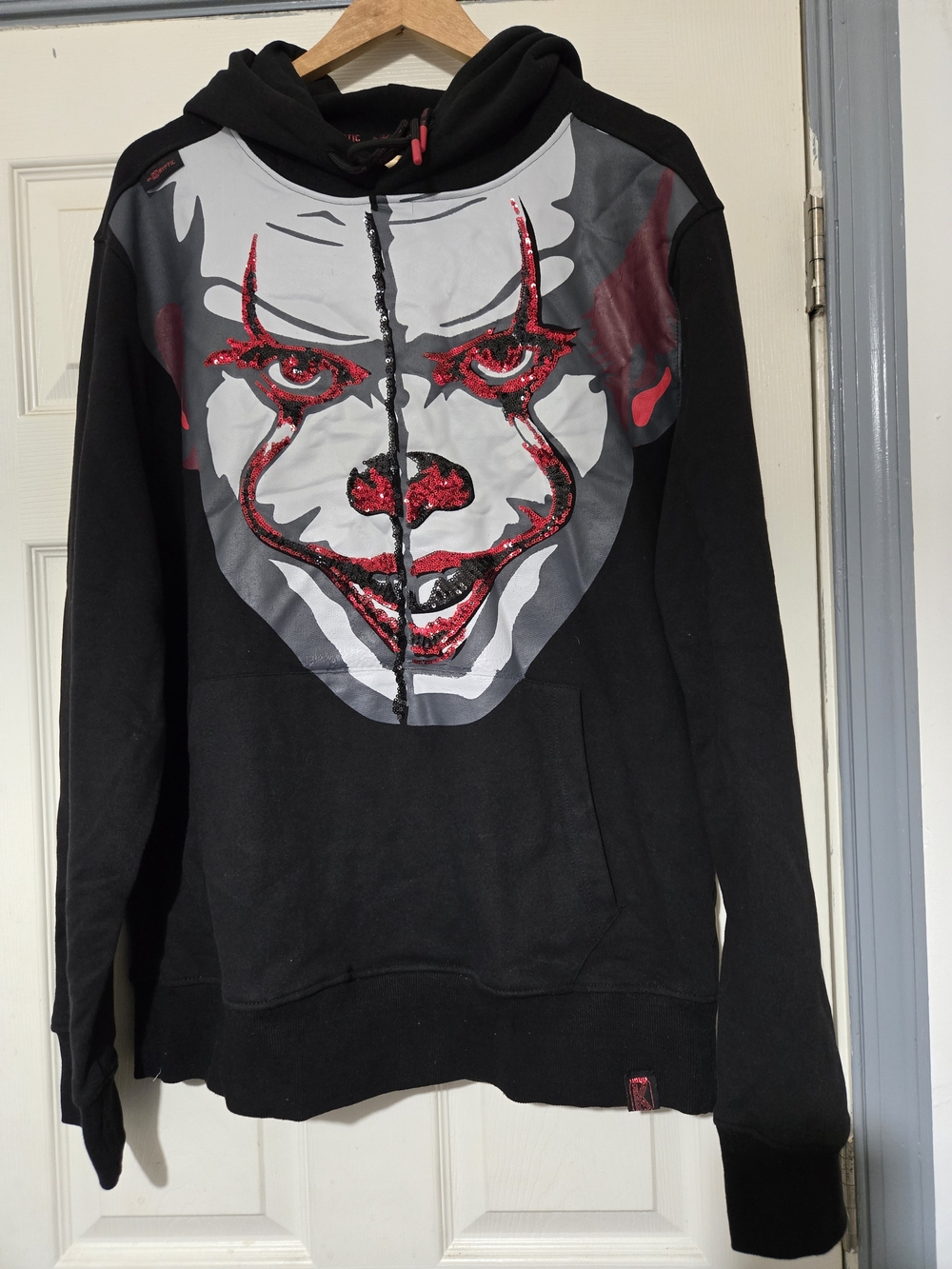Bioworld Black Hoodie with Gray Face Graphic and Red Sequin Accents